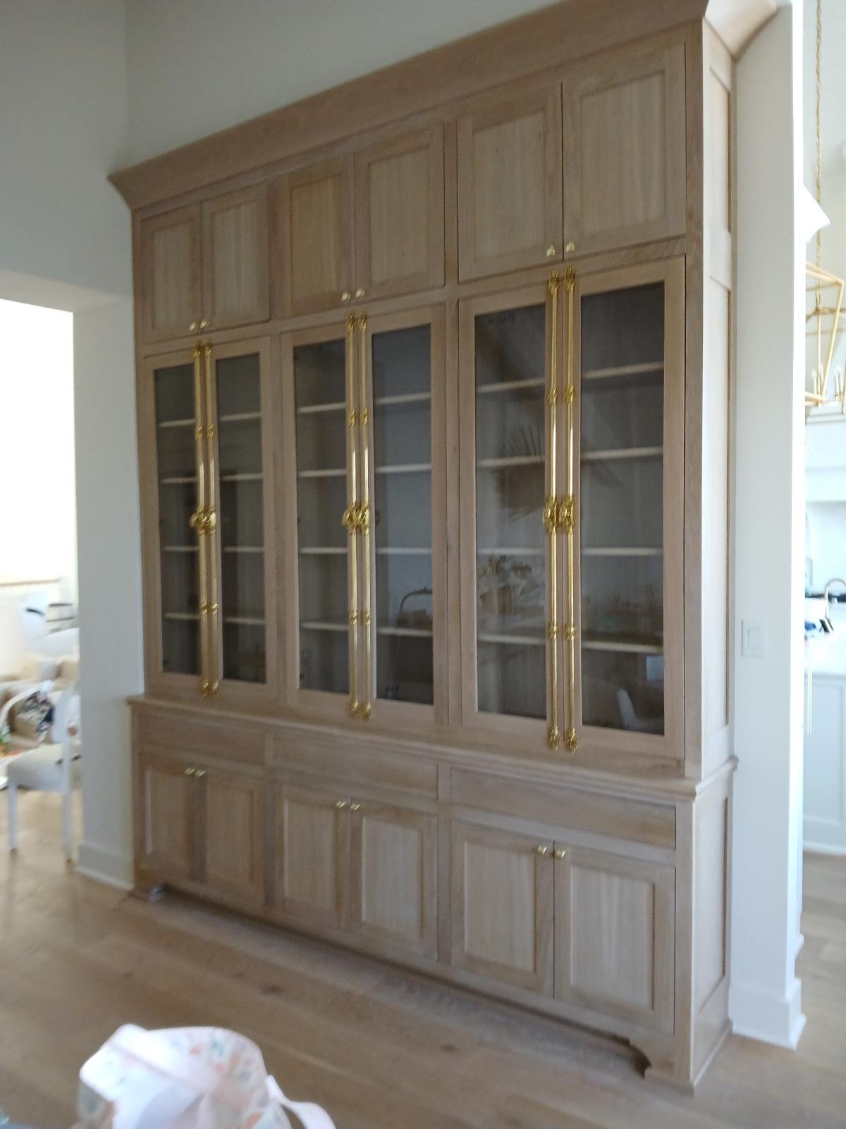 Custom built-in cabinetry with glass doors